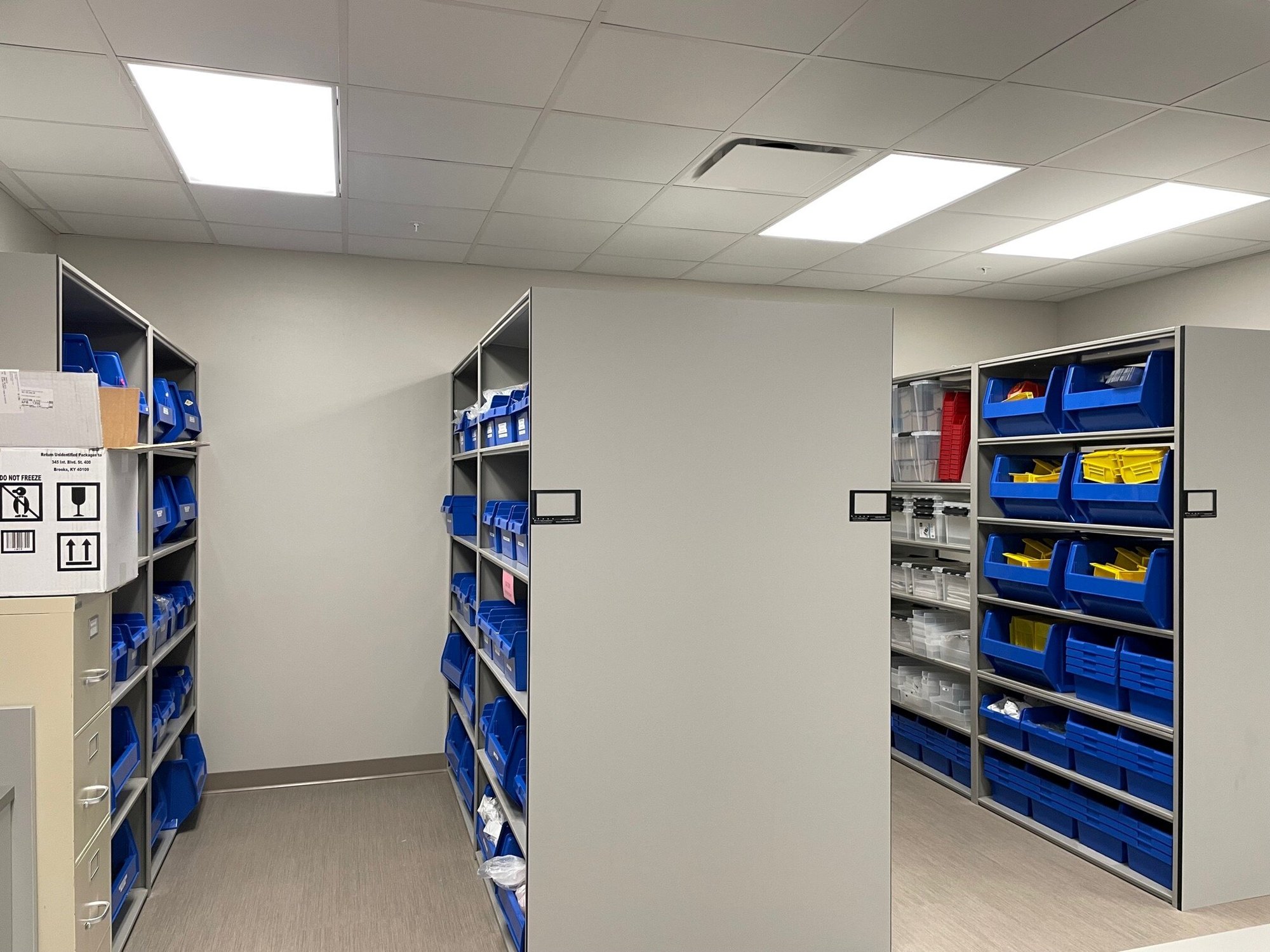 High-density pharmacy storage with bins