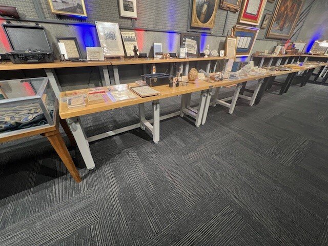 Tables showcasing museum artifacts