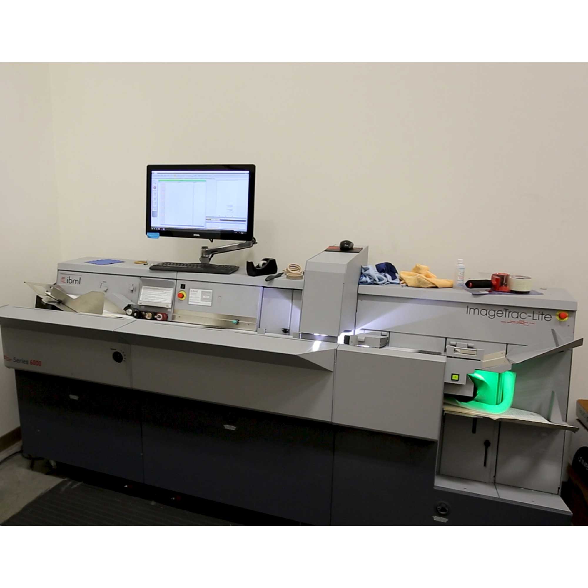 document scanning machine powered on ready to scan