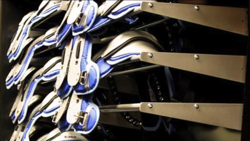 shoulder pad rails for compact and efficient storage of sports gear