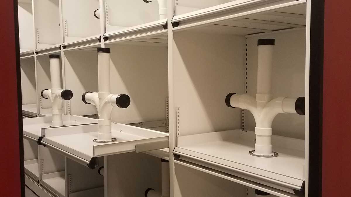 shoulder pad storage trees for organized and ventilated football gear storage