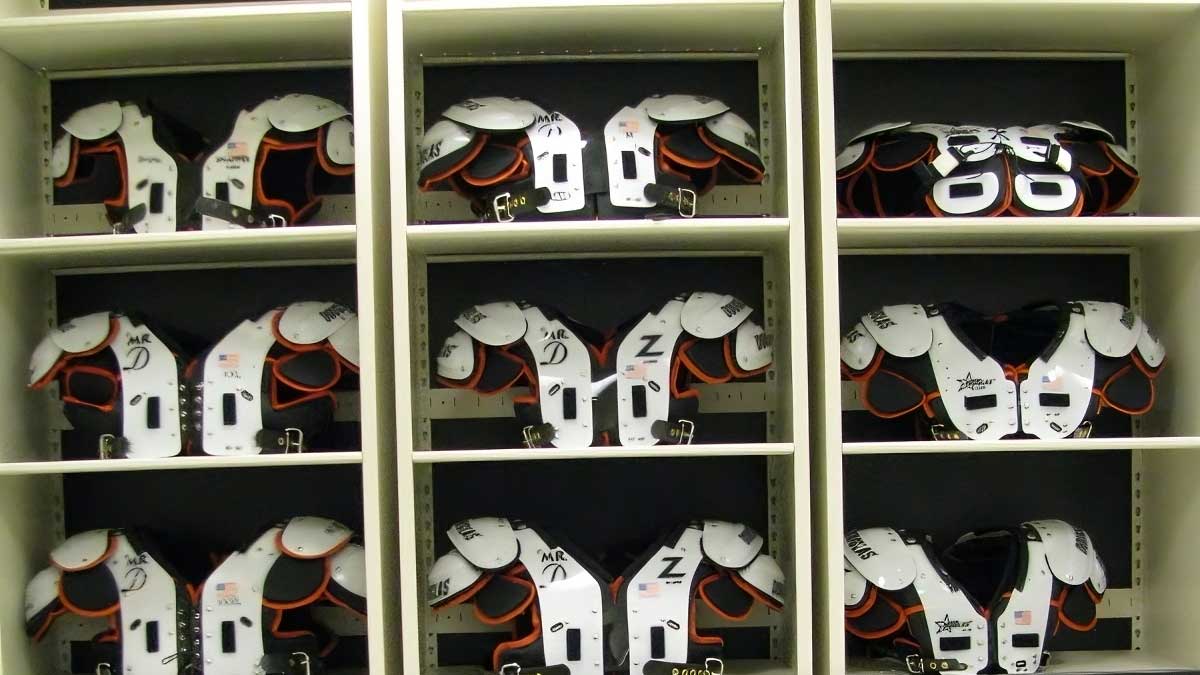 storing shoulder pads football for efficient sports gear organization and protection