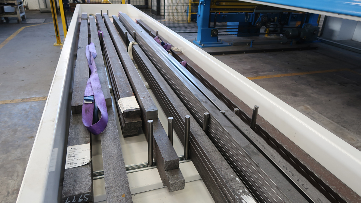 Adjustable pin support system for metal bar storage in industrial facilities