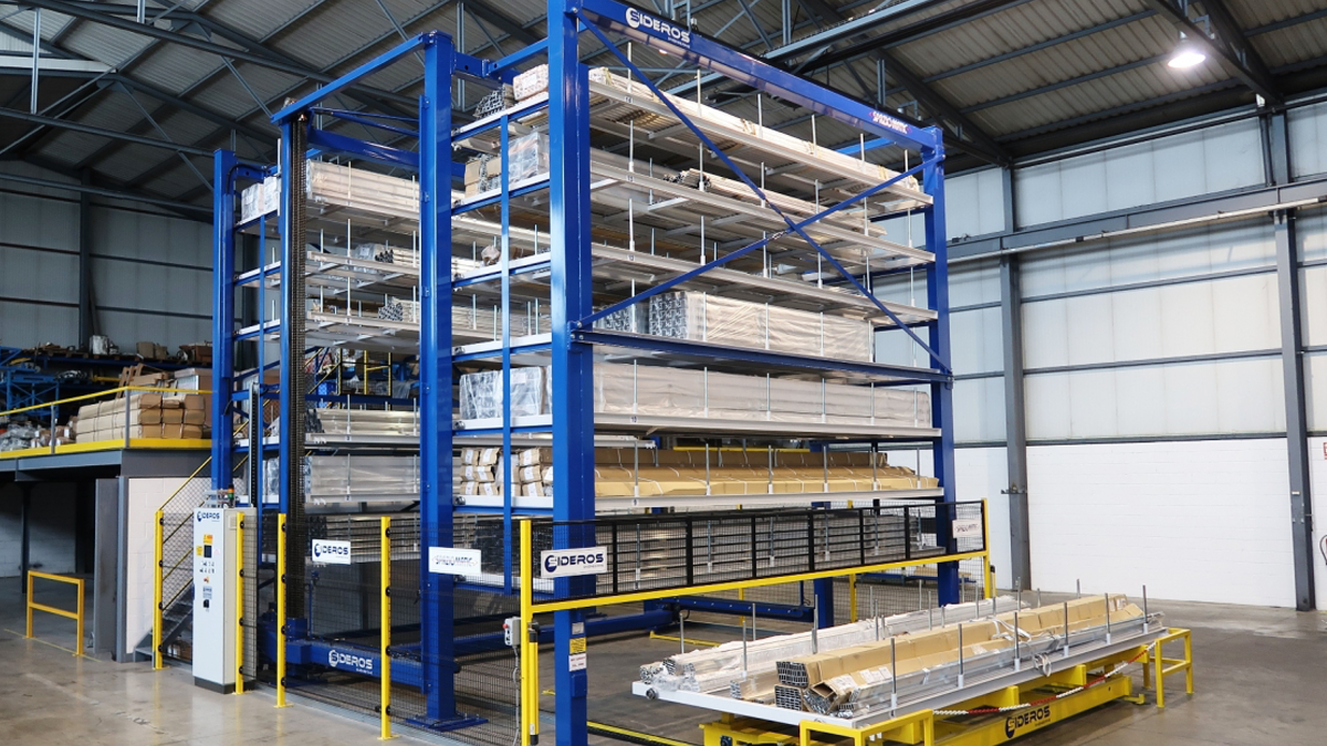 automated storage system for industrial materials and profiles with blue steel frame and multiple drawers for long stock
