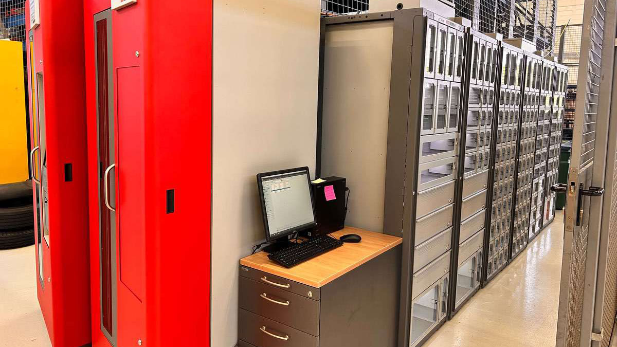 Compact AutoCrib tool vending system in a secure military environment for managing critical parts and gear