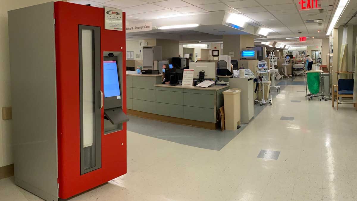 medical vending machine in hospital hallway used for secure dispensing of healthcare supplies to staff