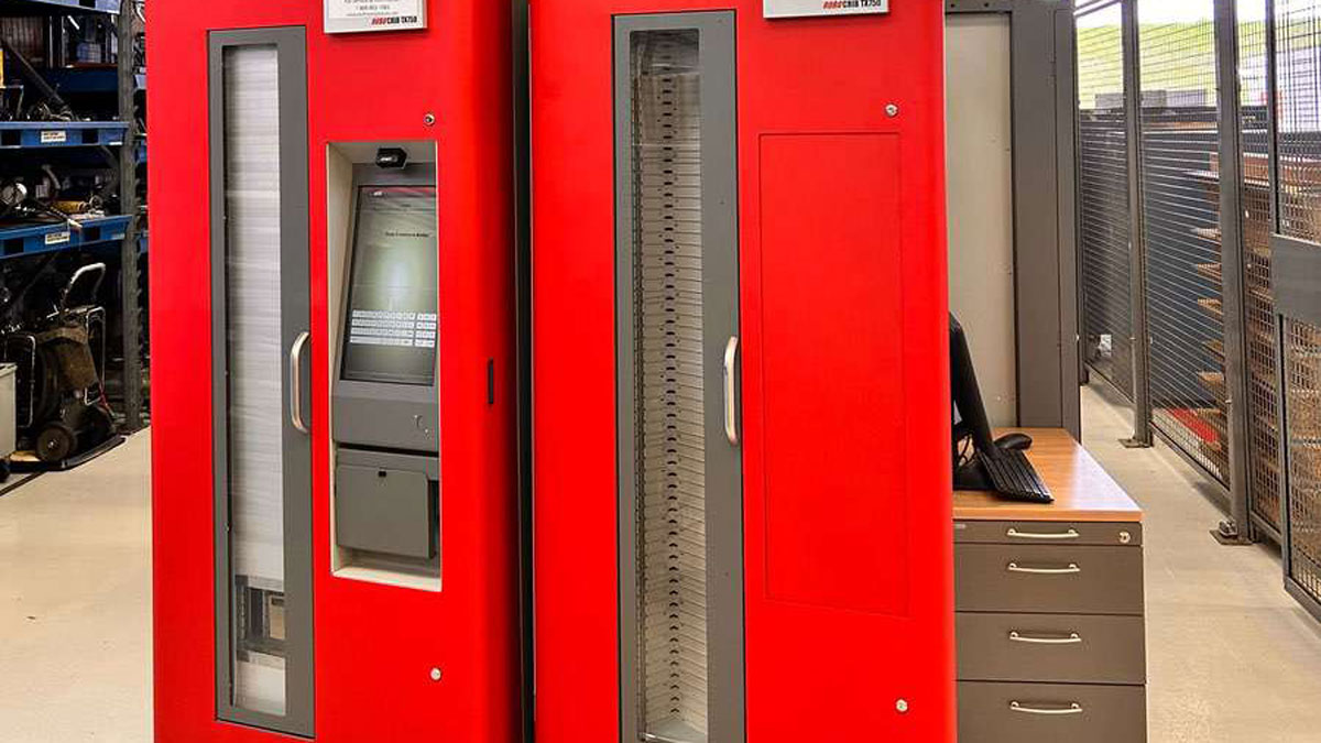 Red and gray AutoCrib vending lockers in a high-security military base, tailored for tool tracking and asset control