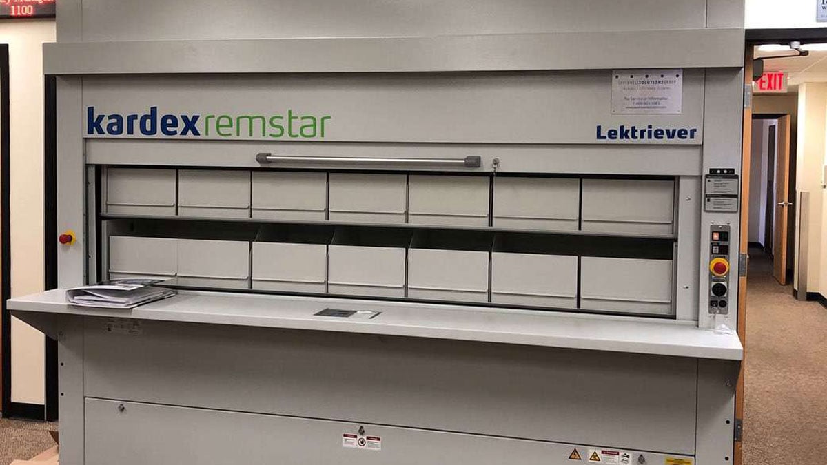 Vertical carousel filing with boxed medical records