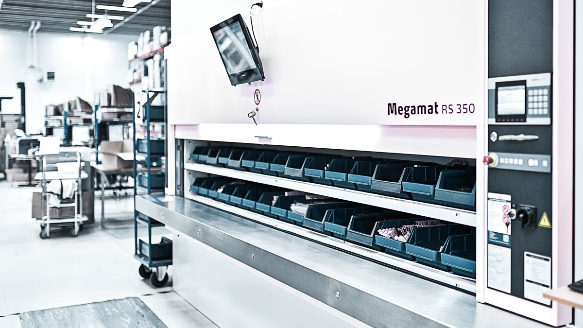 Front view of a Kardex Remstar Megamat RS 350 vertical carousel, a high-density automated storage solution for industrial inventory management