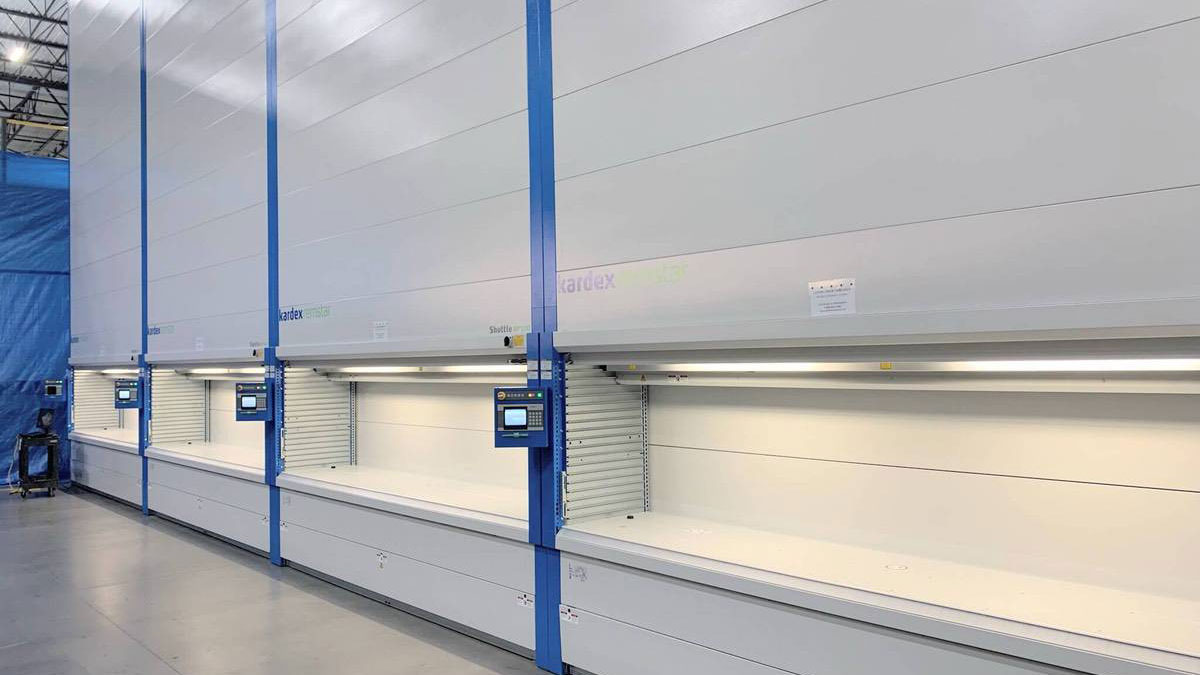 Kardex Remstar vertical lift modules in a modern warehouse for inventory automation