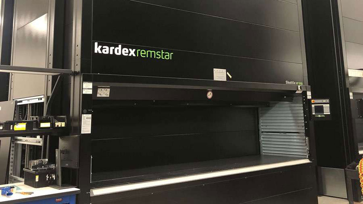 Kardex Remstar vertical lift module in black finish used by BAE Systems for secure and efficient storage of military components