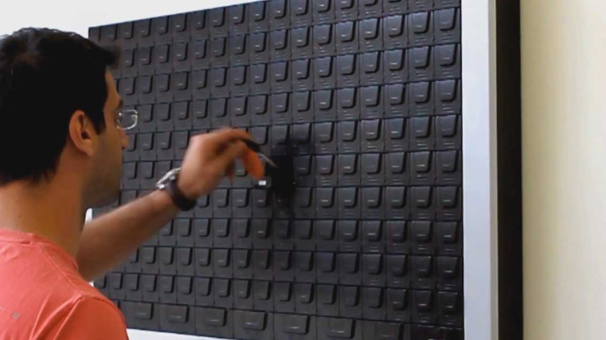 user operating touchscreen interface on electronic key cabinet to authenticate and retrieve assigned key