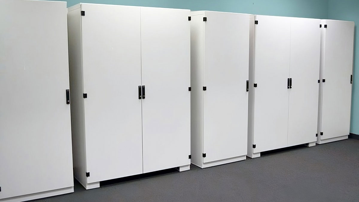 Row of herbarium drying cabinets with mixed door configurations