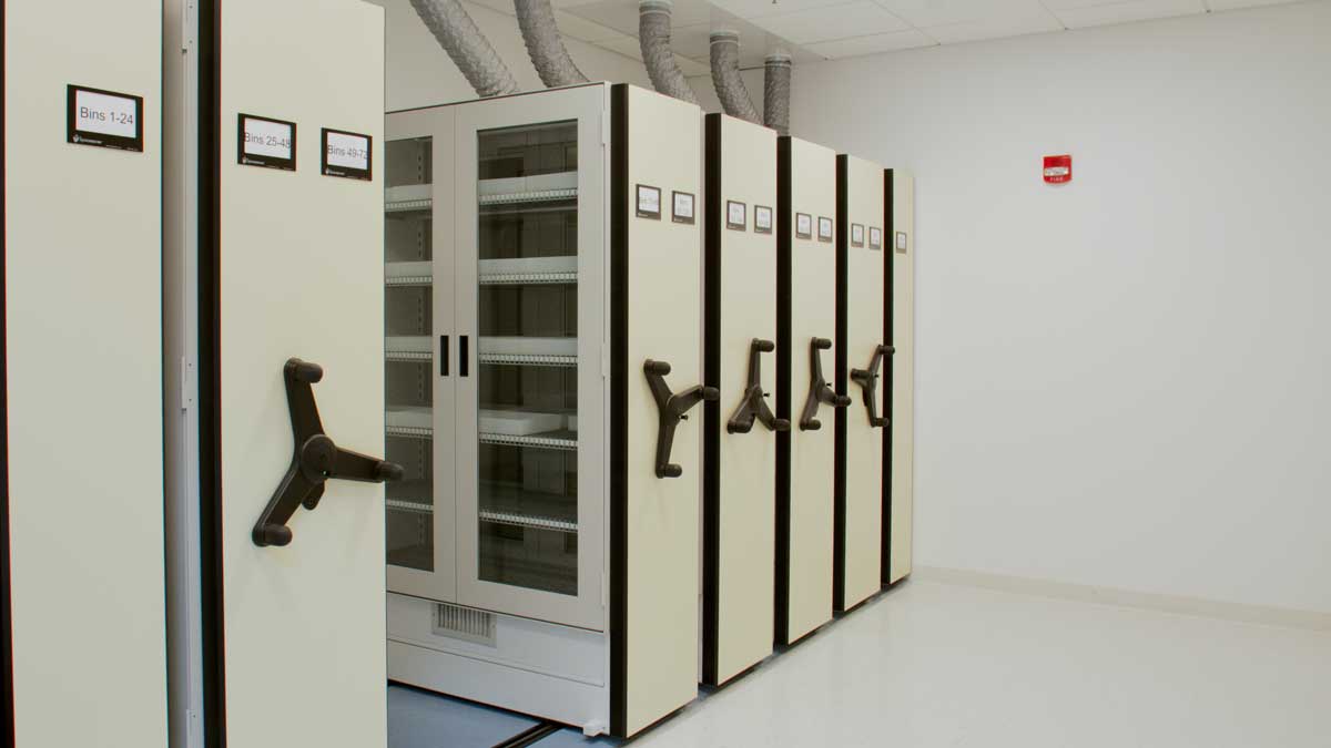 A ventilated storage cabinet designed for museum collections, featuring adjustable shelves and secure compartments