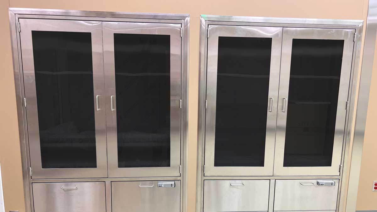 cabinet with two front doors and internal shelves for secure storage and clear visibility of contents