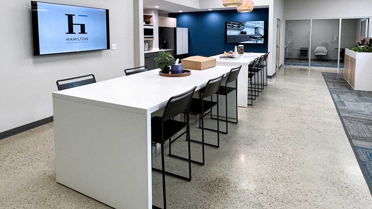 White island table with cabinets in an office break area