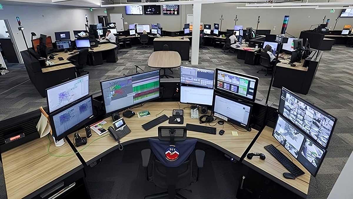 Police command workspace with operator stations and integrated monitoring