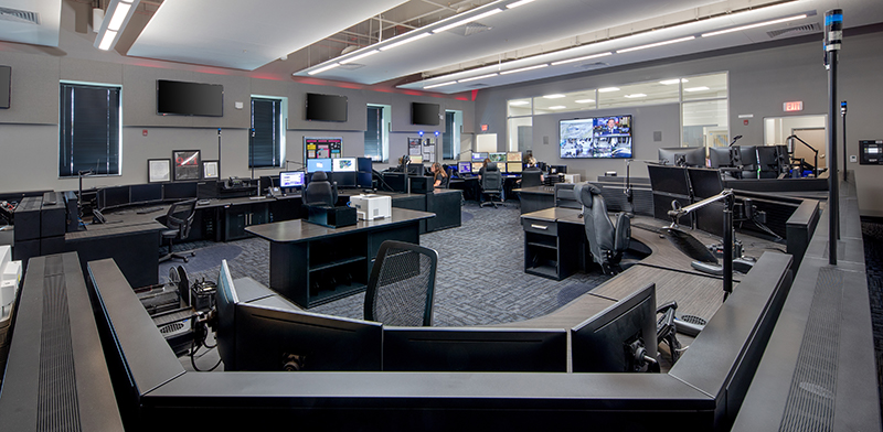 United operations center showcasing organized workstations and large screens for monitoring and operational control