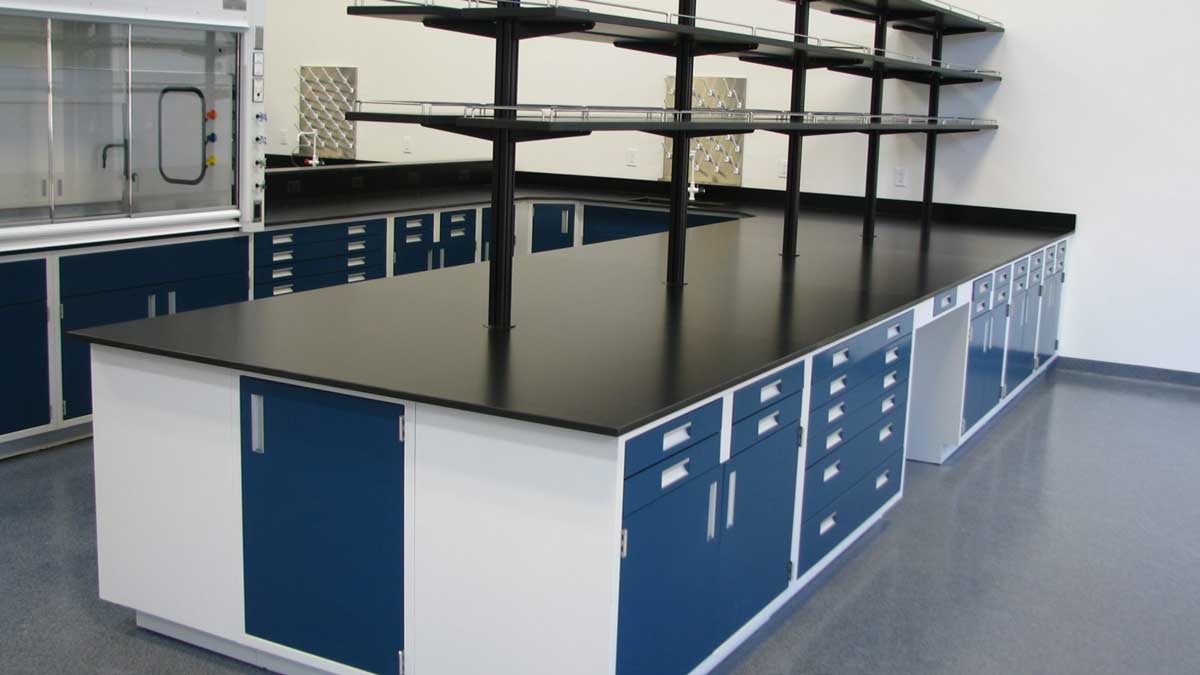 laboratory metal casework with upper shelving and ample workspace for organized scientific tasks