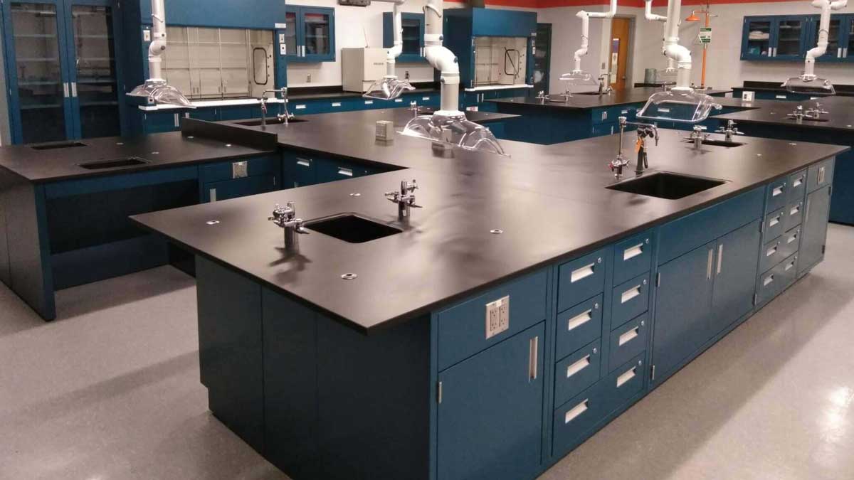 laboratory metal casework featuring sink, drawers, and upper cabinets designed for organized lab environments