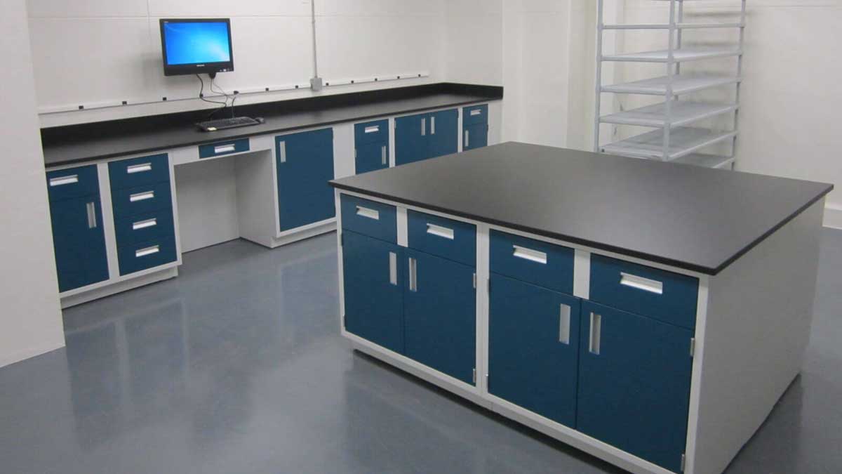 laboratory metal casework setup featuring integrated sink and power outlets for optimized laboratory work