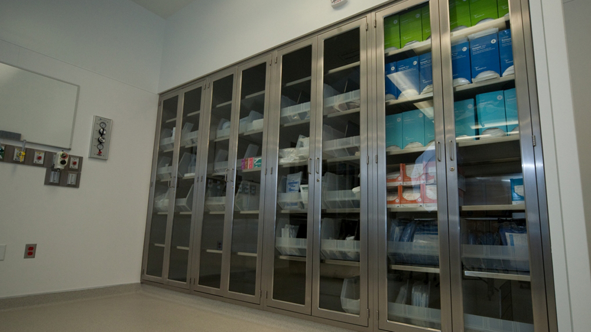 stainless steel healthcare cabinets with glass doors for sterile storage in medical environment