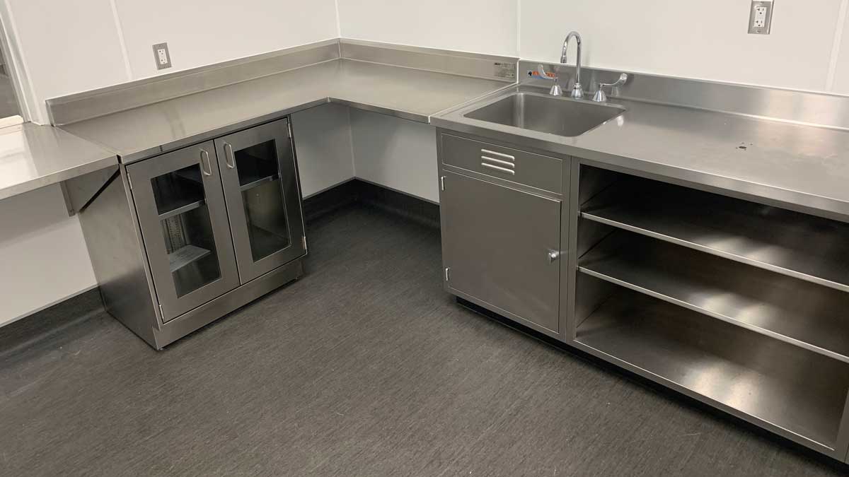 stainless steel lab storage cabinets with workspace for scientific and medical applications