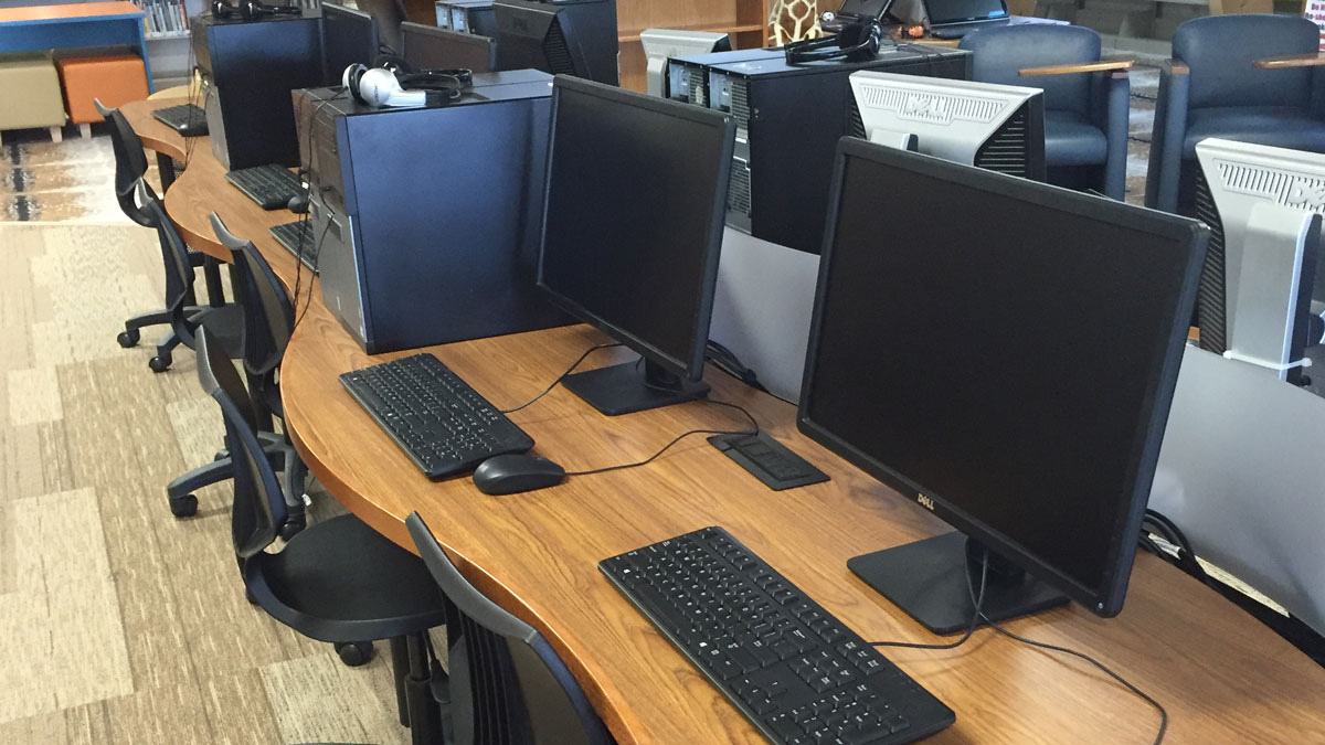 Library computer stations with ergonomic design