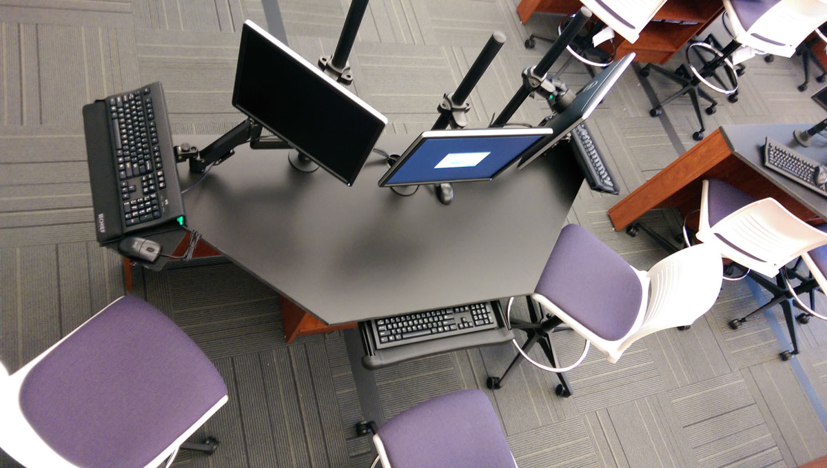 Modern library furniture including tables and seating