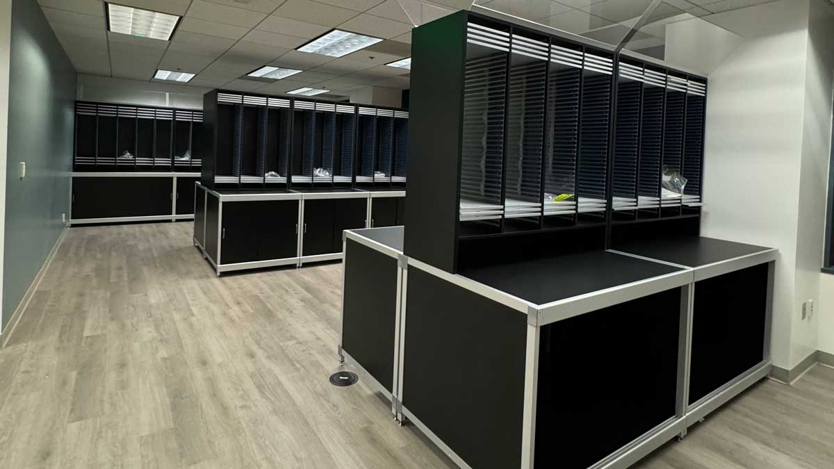 Mailroom with modular sorting and storage shelves designed to organize documents and manage mail