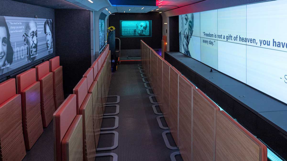 wall-mounted folding seats in a business interior with multimedia panels