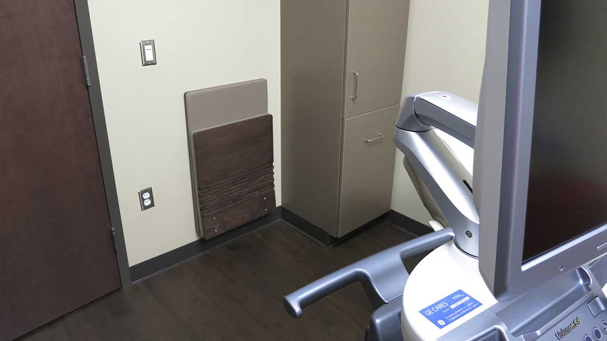 wall-mounted folding jumpseat chairs for compact and flexible seating in healthcare and schools