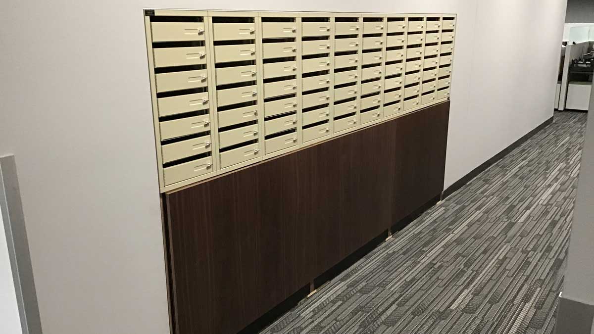 City of Grand Prairie mailroom with through-wall mail slots system for secure mail delivery and sorting