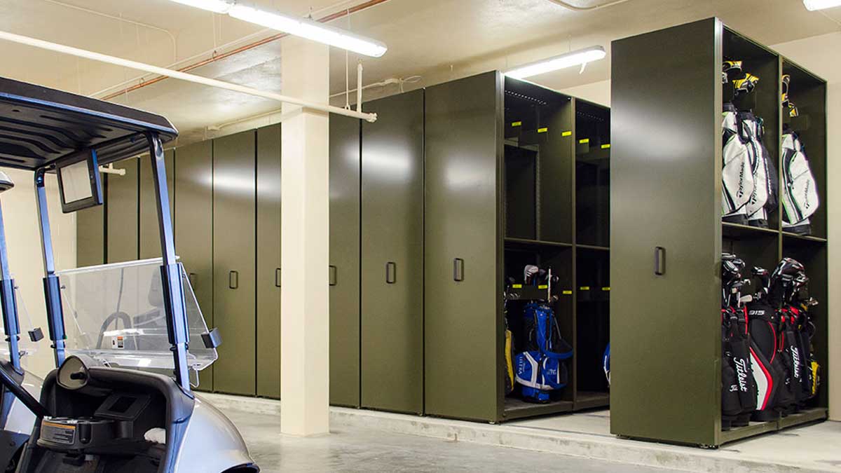 high-density mobile shelving with vertical compartments for organized golf bag storage at country clubs