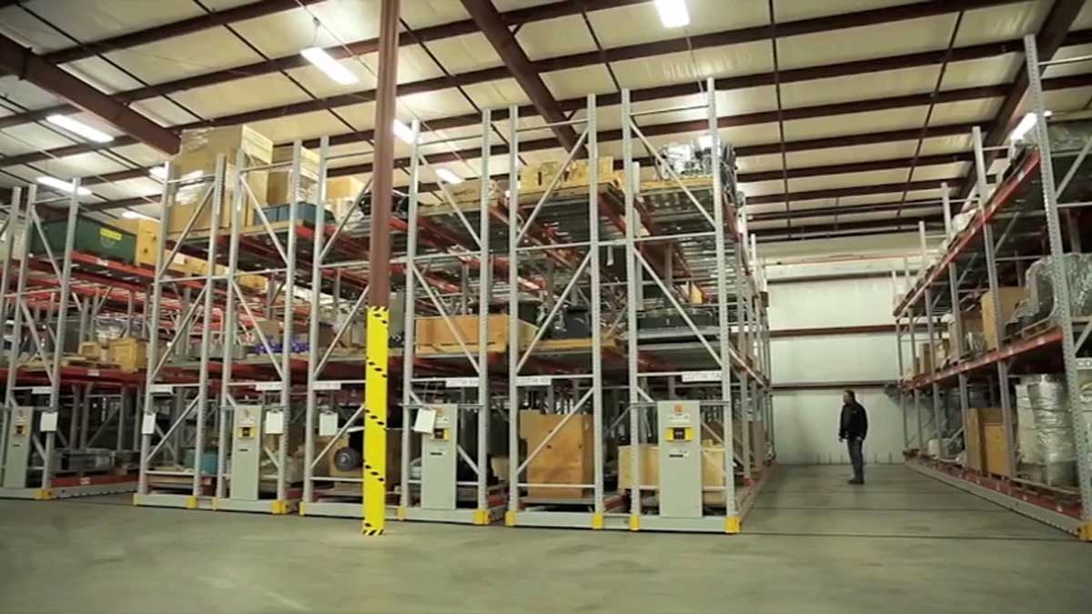 mobile pallet racks on tracks for saving warehouse space and improving material handling