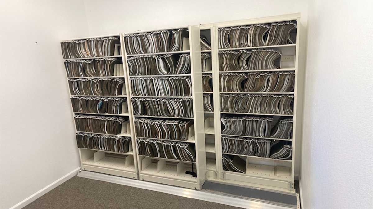 Bi-file sliding shelving system in a family practice for organized patient records
