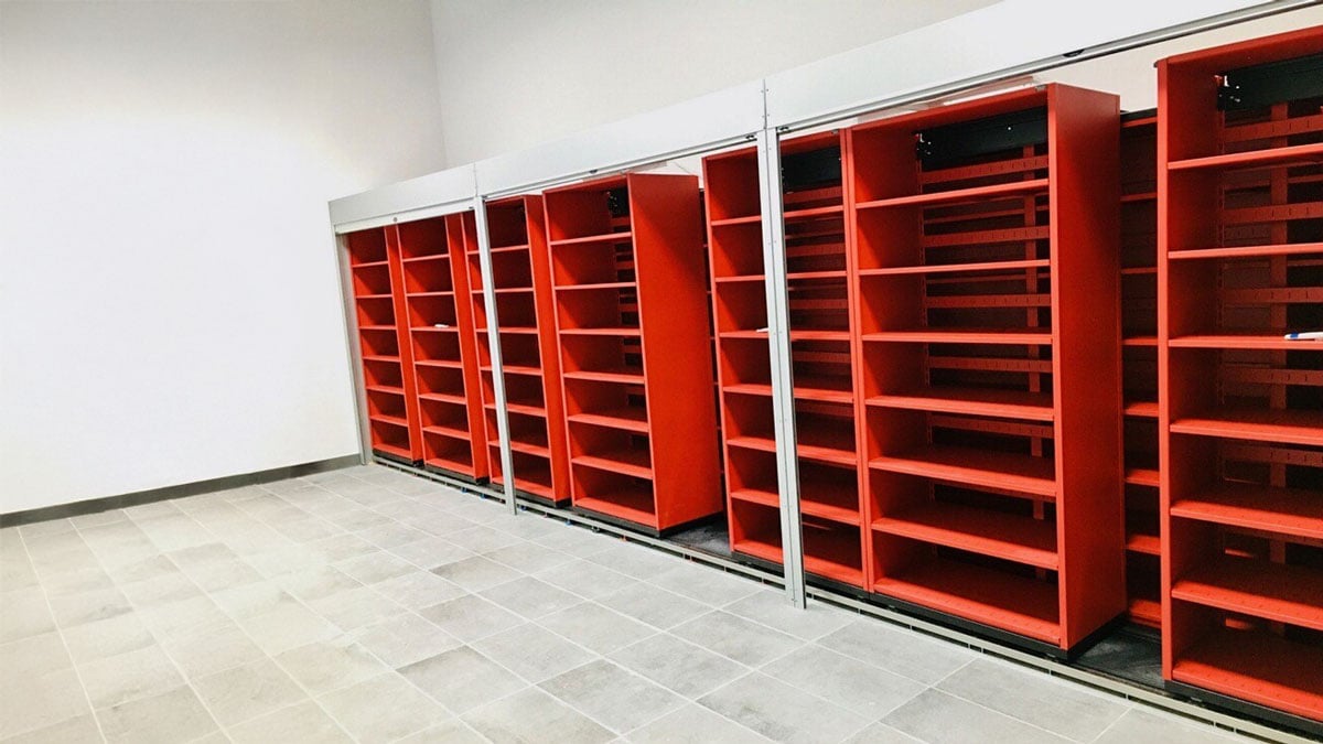Sliding office shelving on tracks