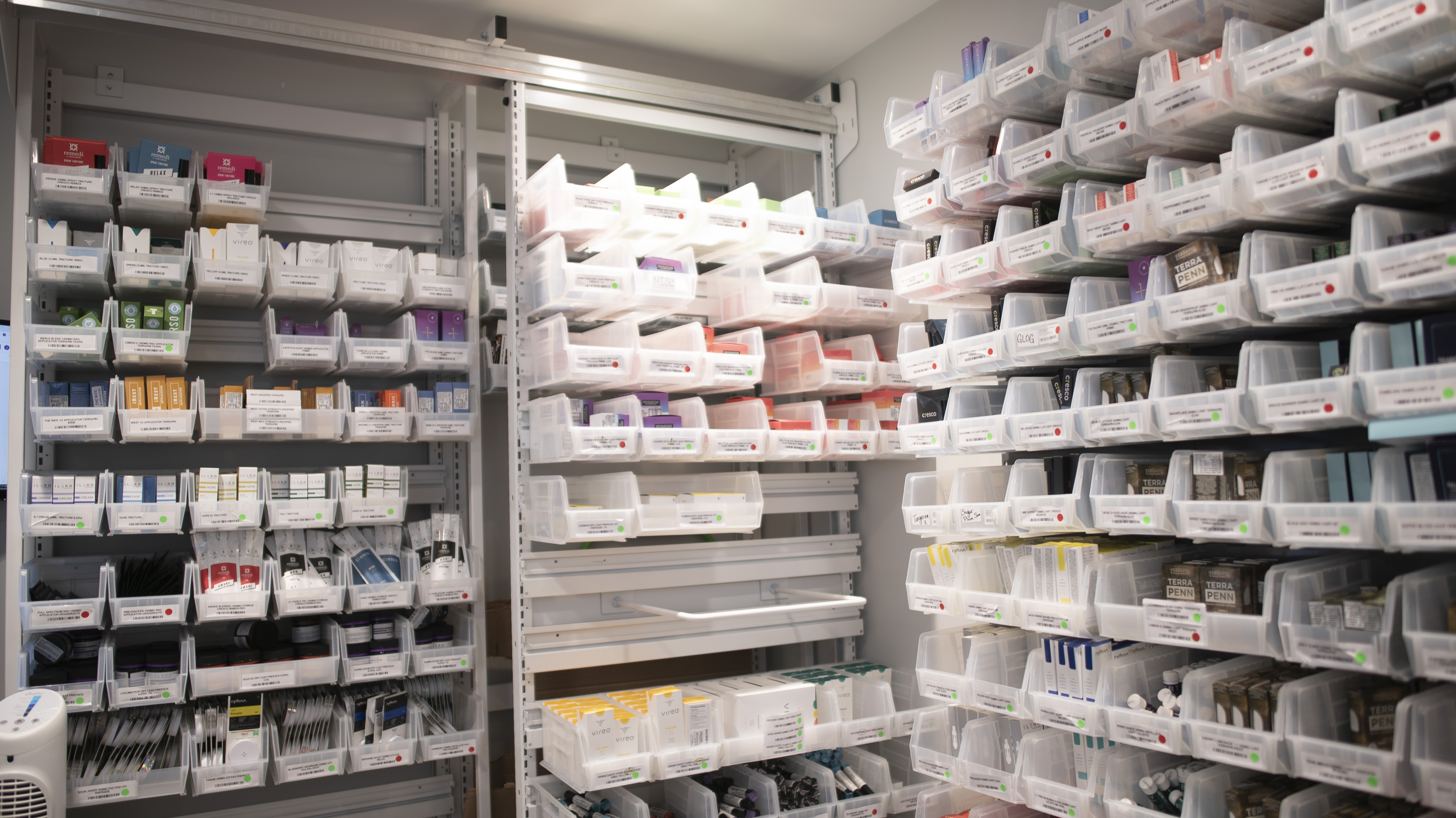 Secure vault shelving system in a cannabis dispensary for safe and organized product storage