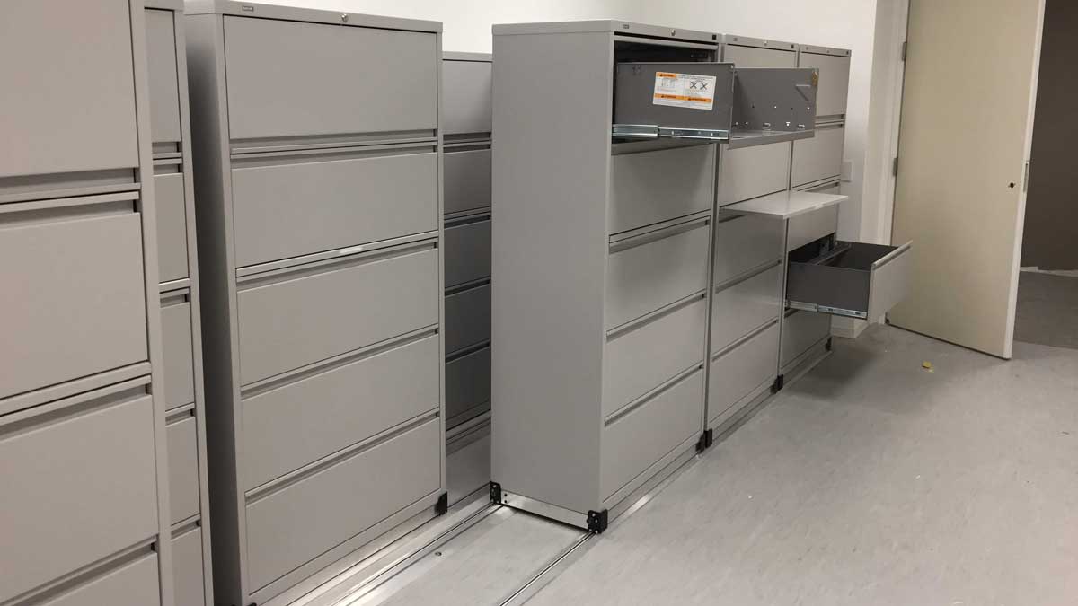 Sliding lateral file cabinets offering efficient office document storage and space-saving design