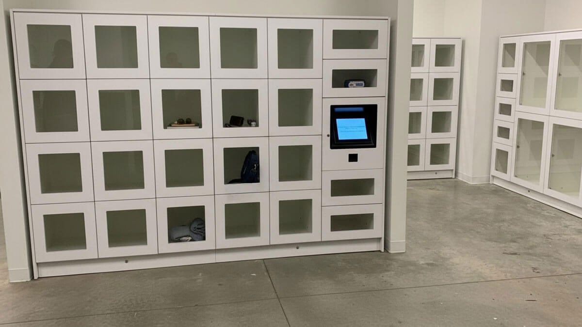 Modern office smart locker system with digital access control and personal storage compartments.