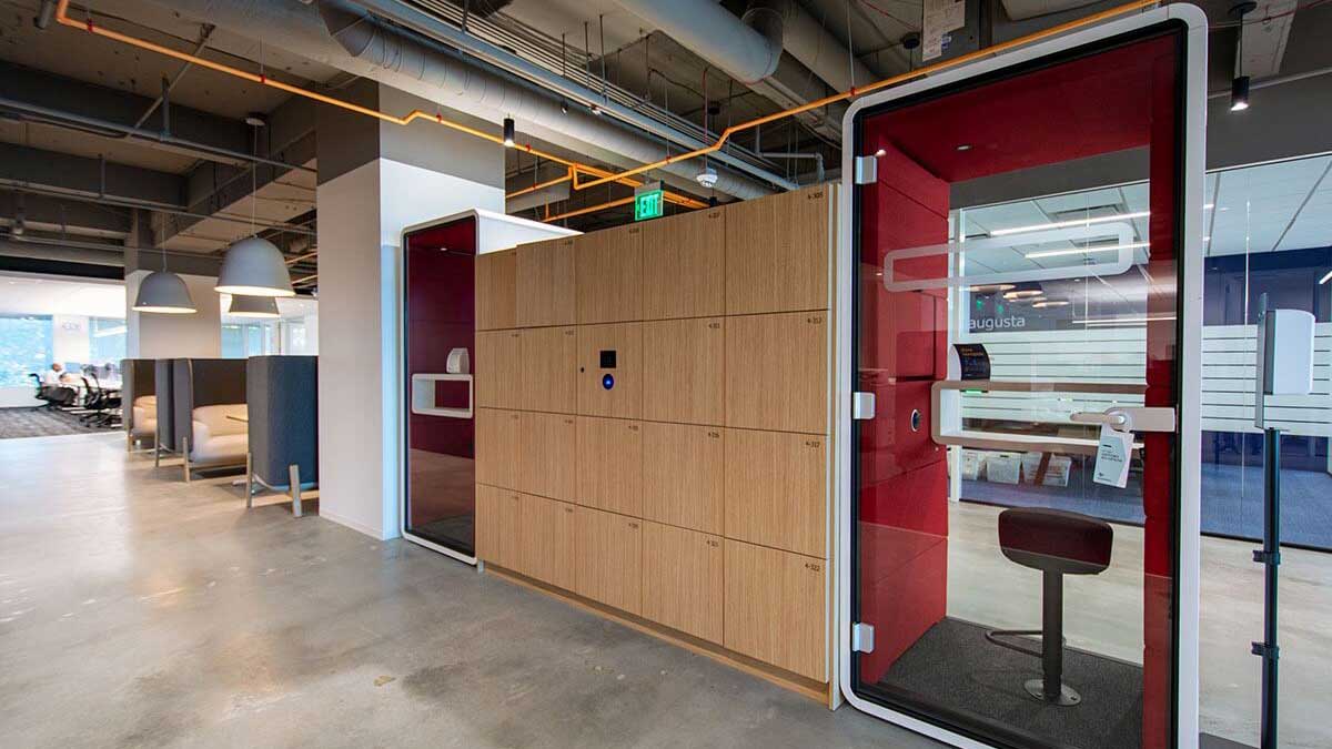 Keyless office lockers with electronic access next to acoustic phone booths