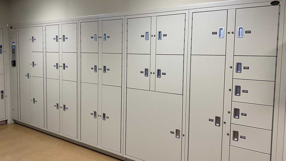Digital evidence lockers with labeled compartments for secure chain-of-custody storage