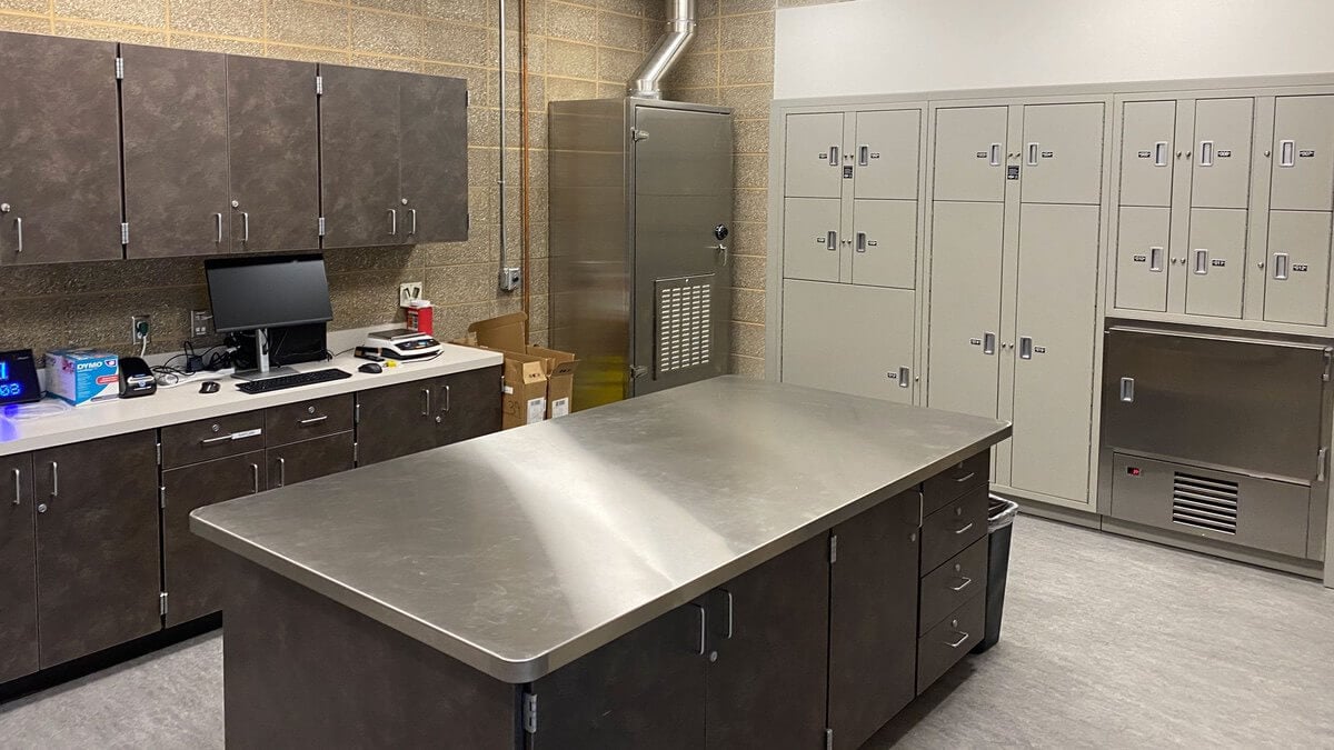 Evidence drying lockers in forensic lab with stainless steel workstations and vent system 