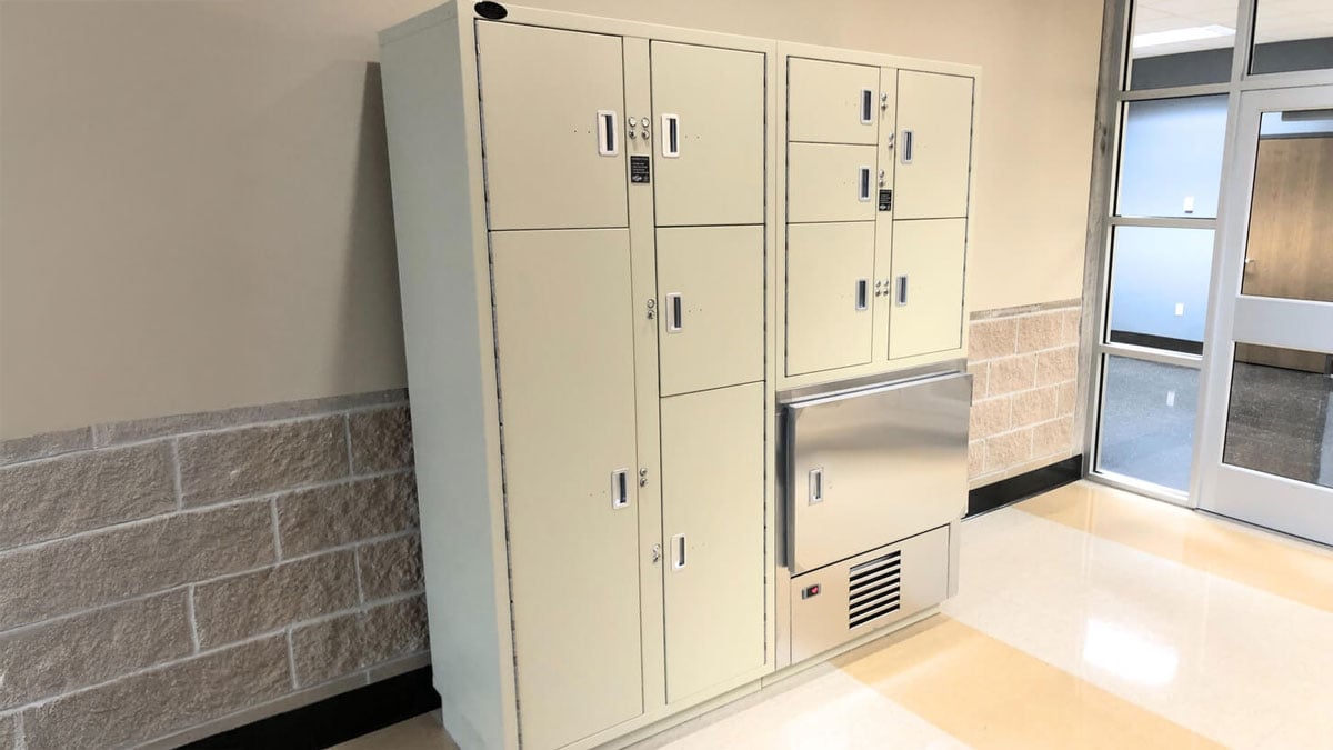Non-pass-through evidence lockers with refrigerated unit for secure item storage