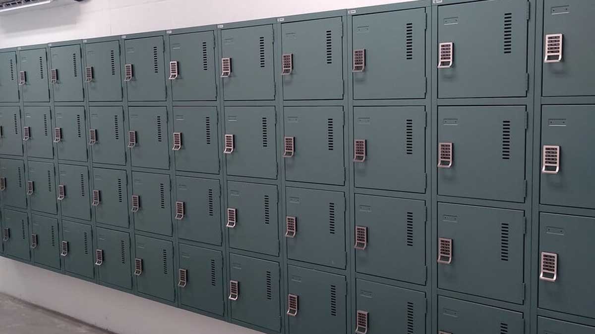 Pass-thru evidence locker storage with stainless steel transfer counter and secure compartments
