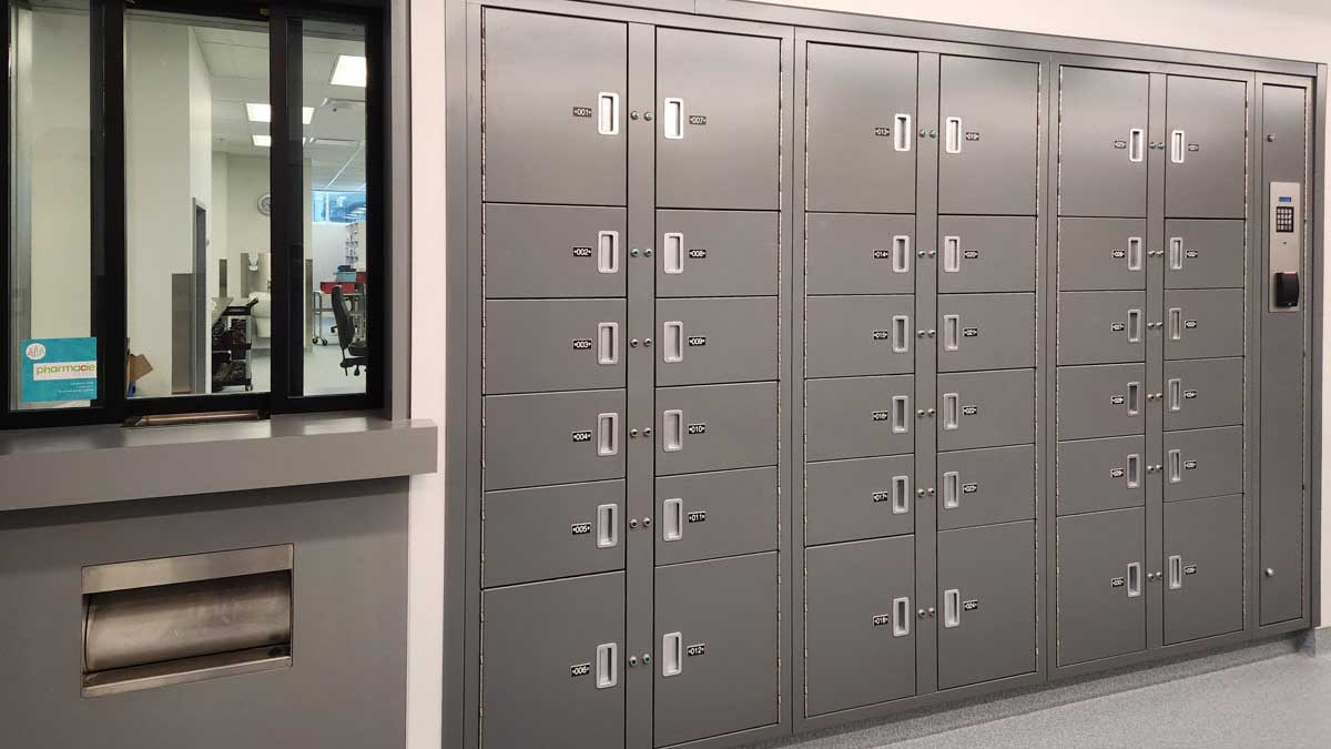 Pass-through lockers with digital keypad access in hospital pharmacy setting