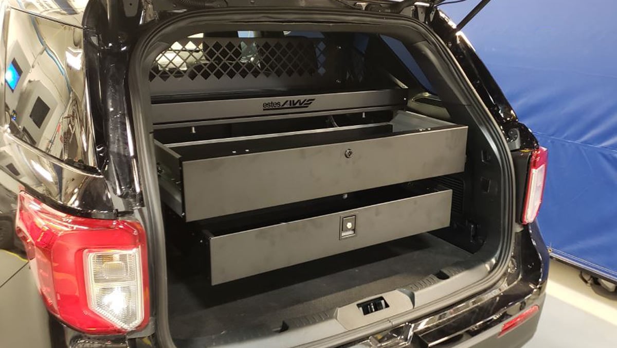 heavy-duty police trunk vault for secure firearm storage in patrol car