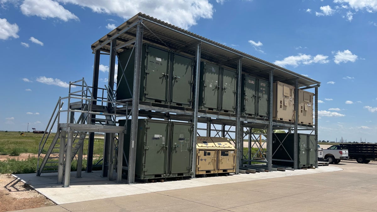 Outdoor container storage rack system for elevated equipment storage