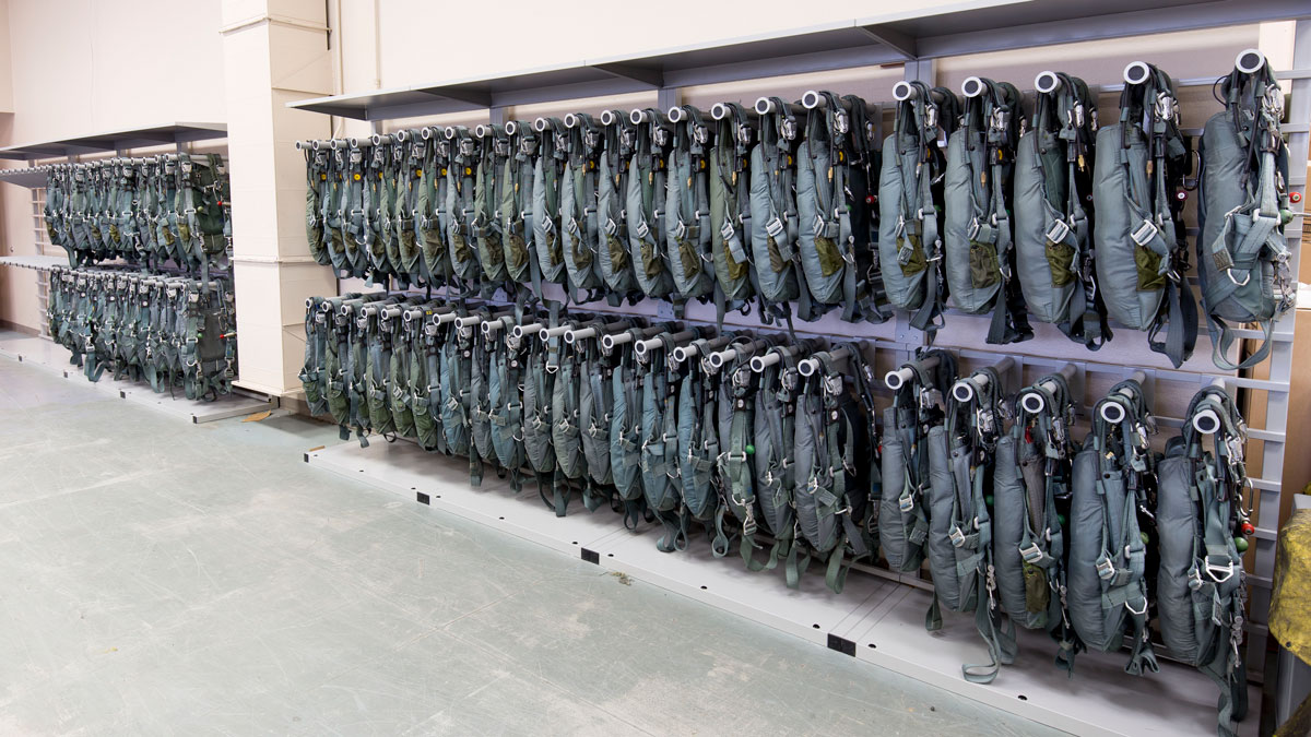 Parachute gear storage rack system for organized equipment access