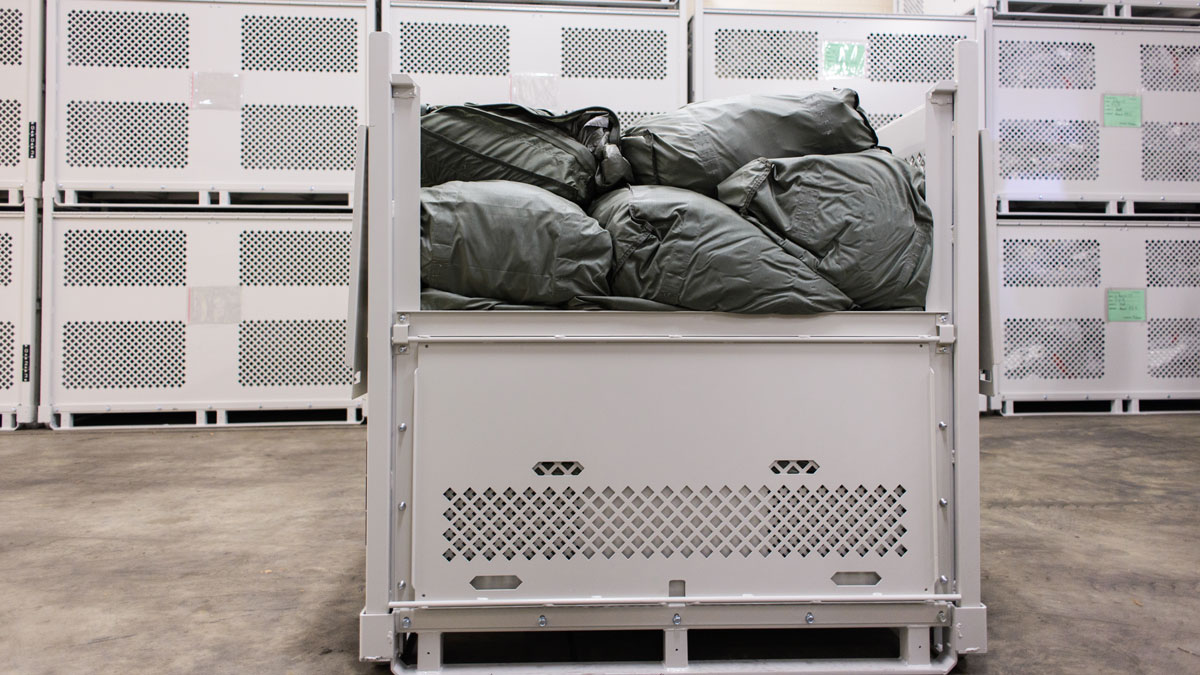 Vented bulk storage container for parachute pack and soft gear storage